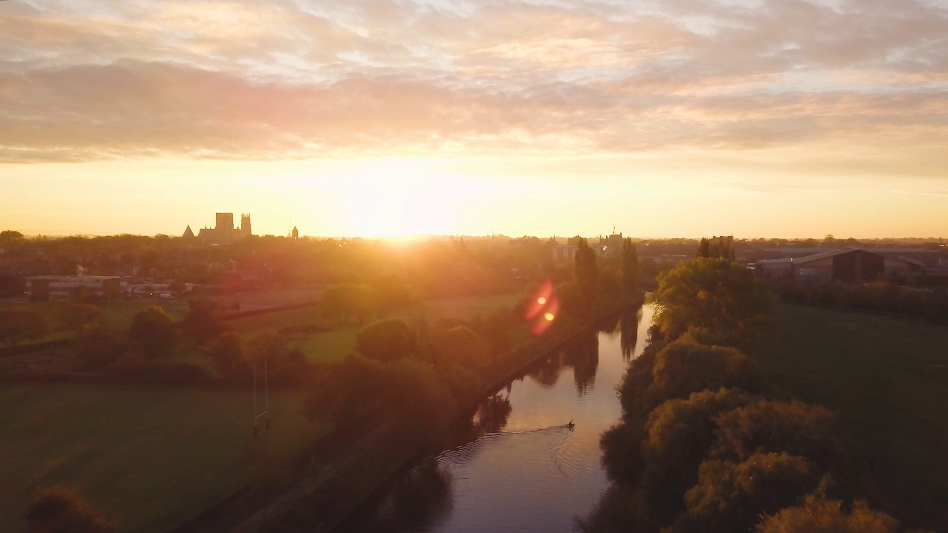Older woman on tricycle in woods